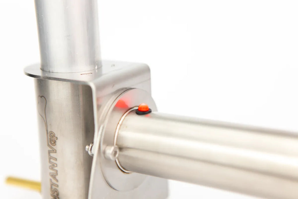 Close up of InstantVap® Lite 18V vaporiser LED indicator and stainless steel dosing chamber