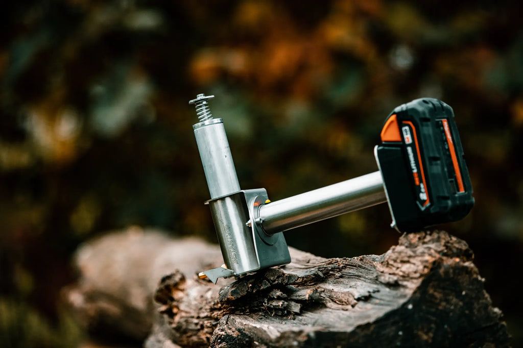 InstantVap Lite beekeeping device for varroa mite treatment shown with compatible battery attached from Bee Brothers