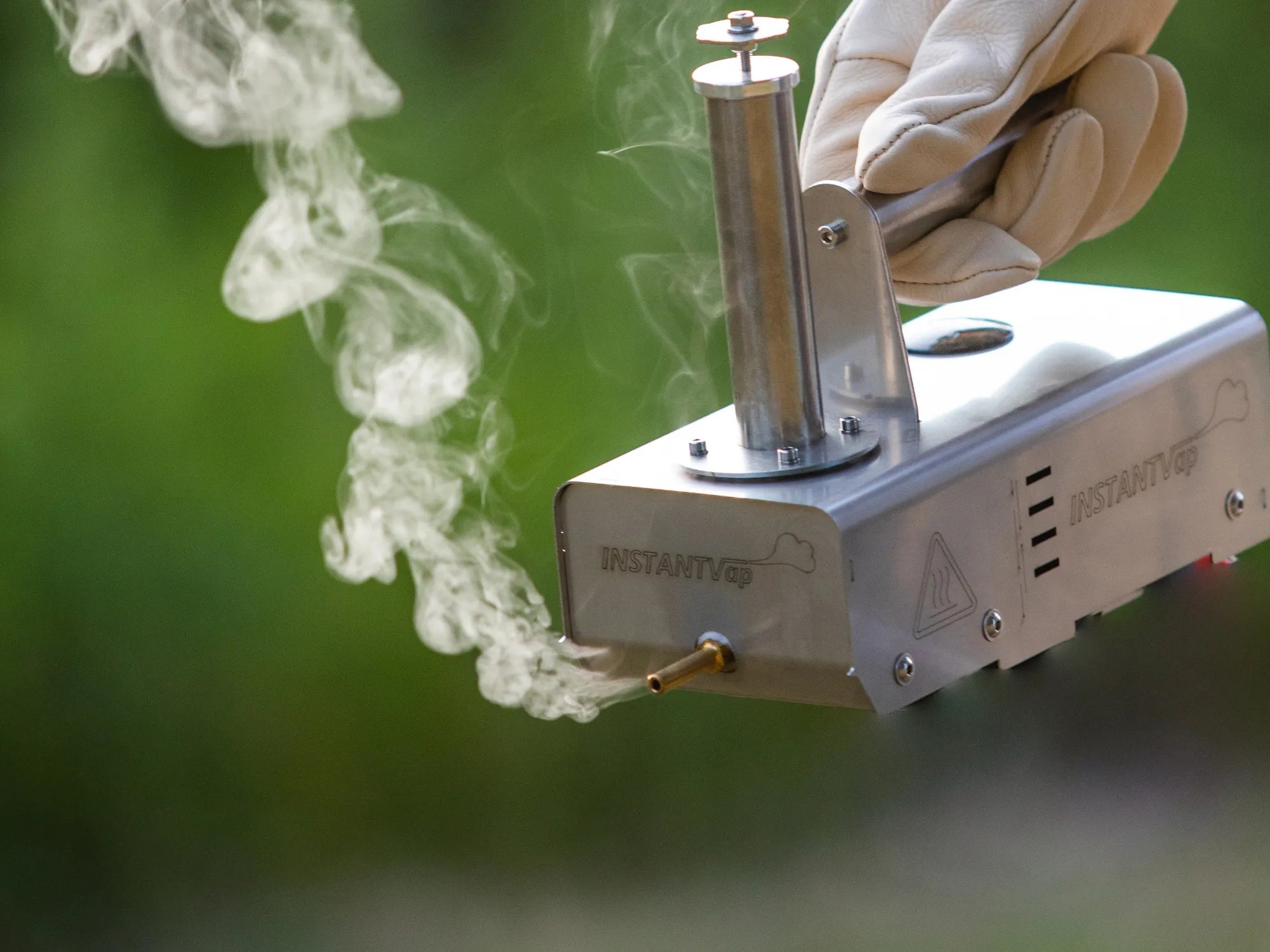 Close up of an InstantVap® vaporiser producing oxalic acid vapour for varroa treatment