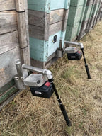 InstantVap telescopic support rod in use beside a row of beehives